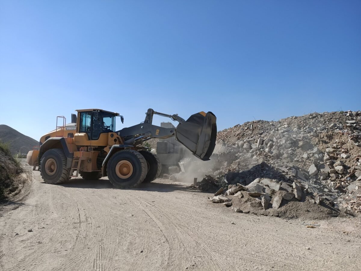 Dust from passing construction vehicles