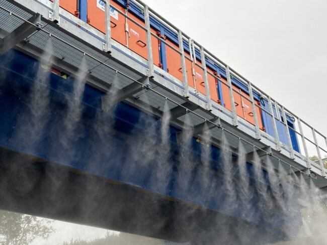 Staubbekämpfung auf einem Kompostsieb